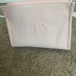 Baby pink Dior cosmetic bag
